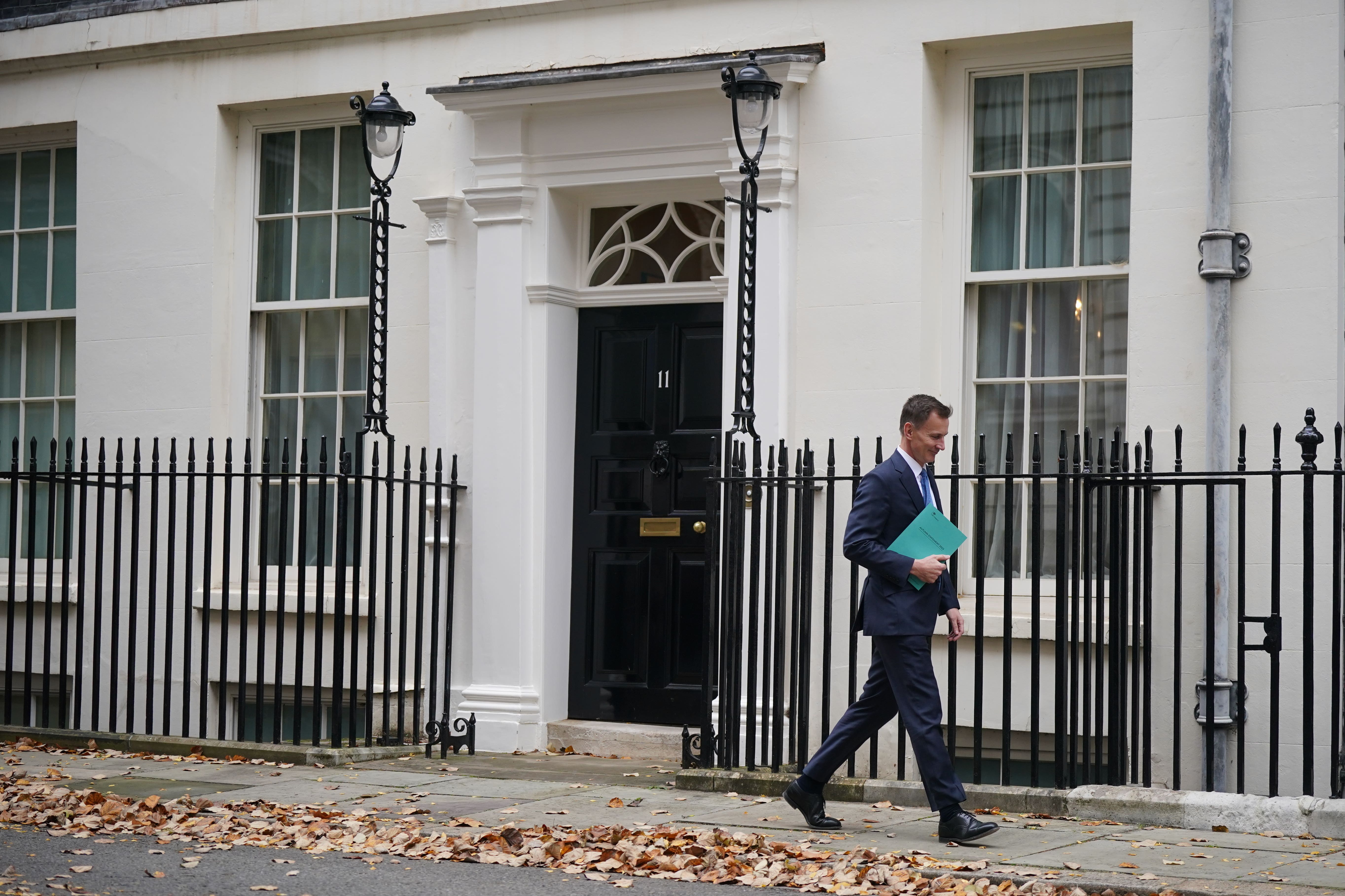 Chancellor of the Exchequer Jeremy Hunt leaves 11 Downing Street ahead of his autumn statement (Yui Mok/PA)