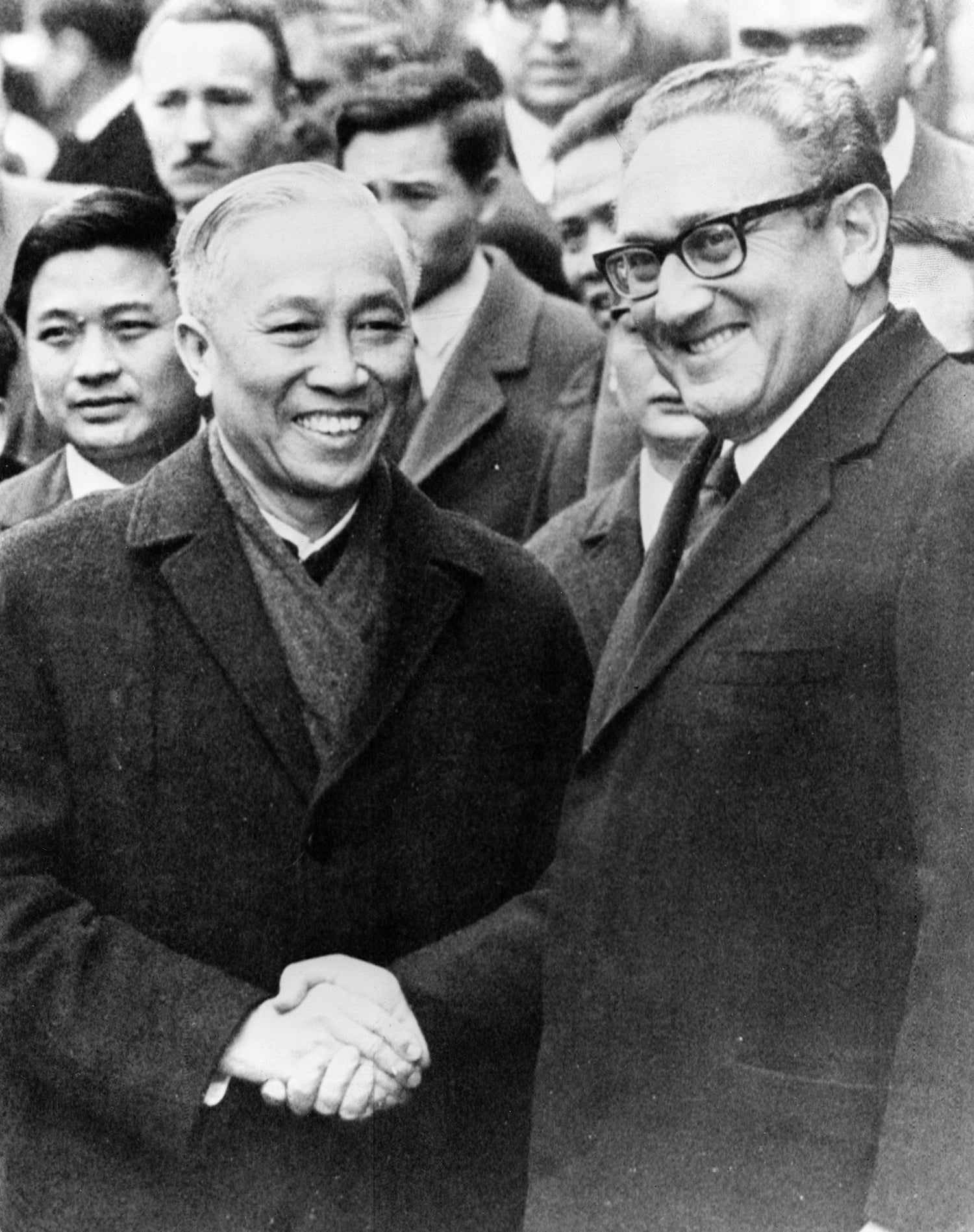 North Vietnamese politburo member Le Duc Tho with Kissinger during peace talks on the Vietnam War in Paris, France on 24 January 1973