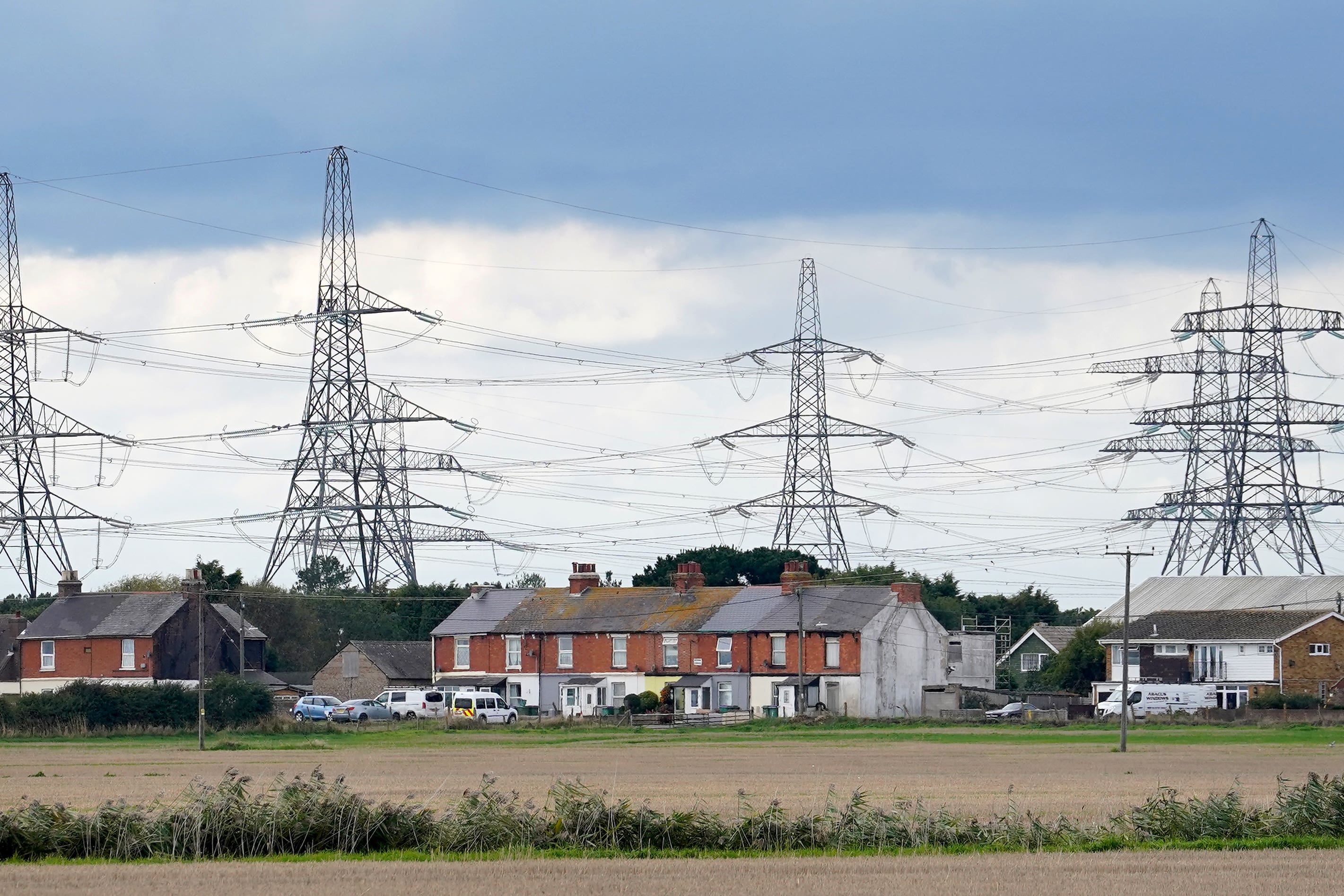 A pledge to give householders money off their electricity bills if their homes are near new powerlines has been dimissed as ‘half-baked attempt to buy people off’ by campaigners against a powerline route in Scotland. (Gareth Fuller/PA)