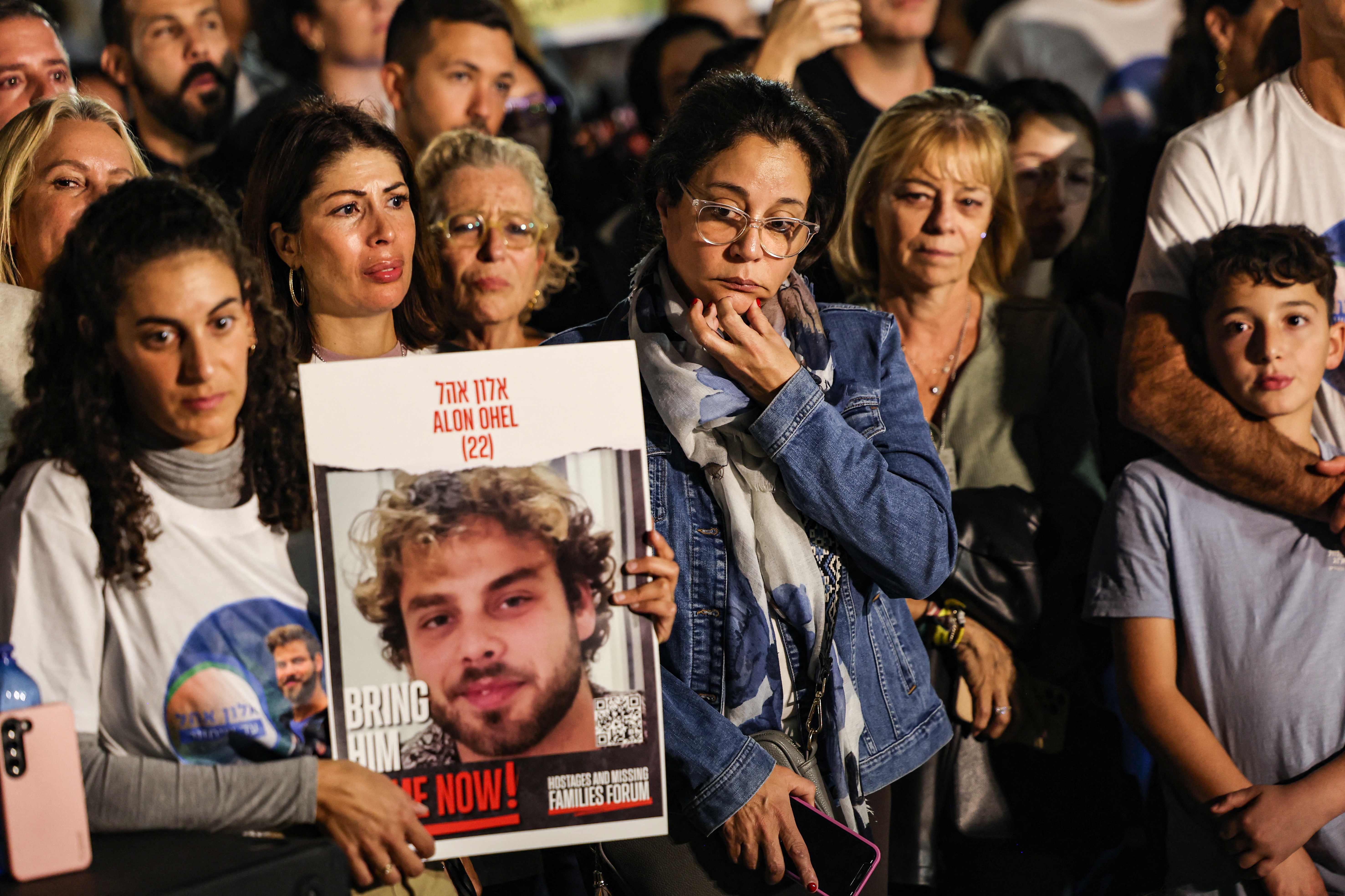 Relatives, friends and supporters of Alon Ohel, who is held hostage by Hamas, take part in a demonstration