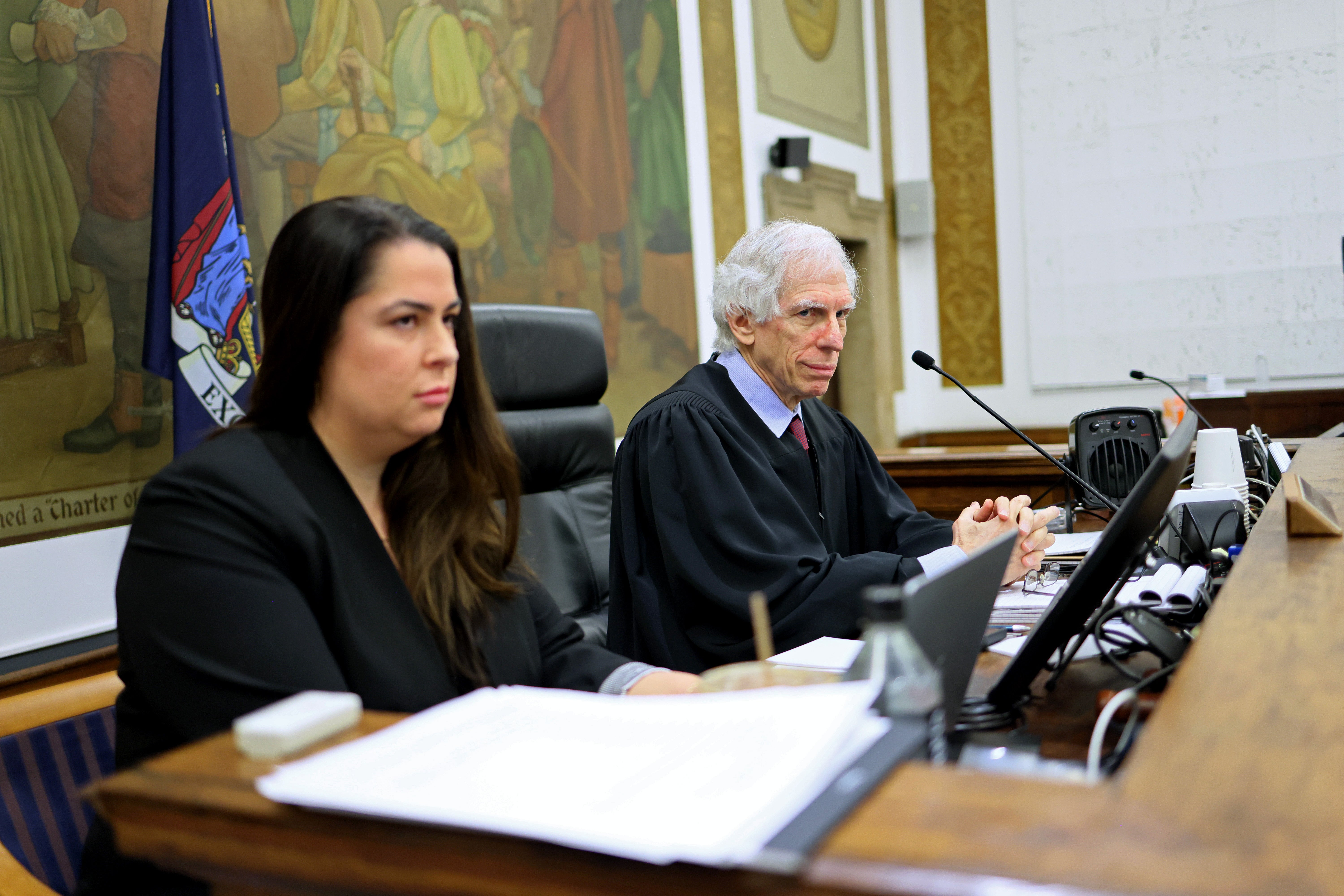 Justice Arthur Engoron, right, presides over Donald Trump’s civil fraud trial on 13 November, with his chief clerk Allison Greenfield beside him.