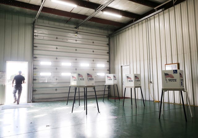 <p>A voter departs after casting his ballot at a polling place in Ray Lounsberry's Shed on November 3, 2020 in Nevada, Iowa.</p>