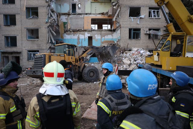 <p>Rescuers clear debris in a hospital in Selydove, Donetsk region damaged by a Russian missile strike</p>