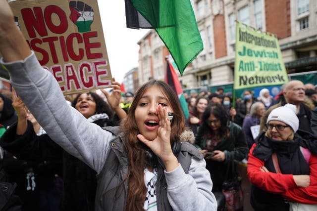 <p>People demonstrate outside the constituency office of Labour Party leader Sir Keir Starmer, in north west London, during a Palestine Day of Action demonstration</p>