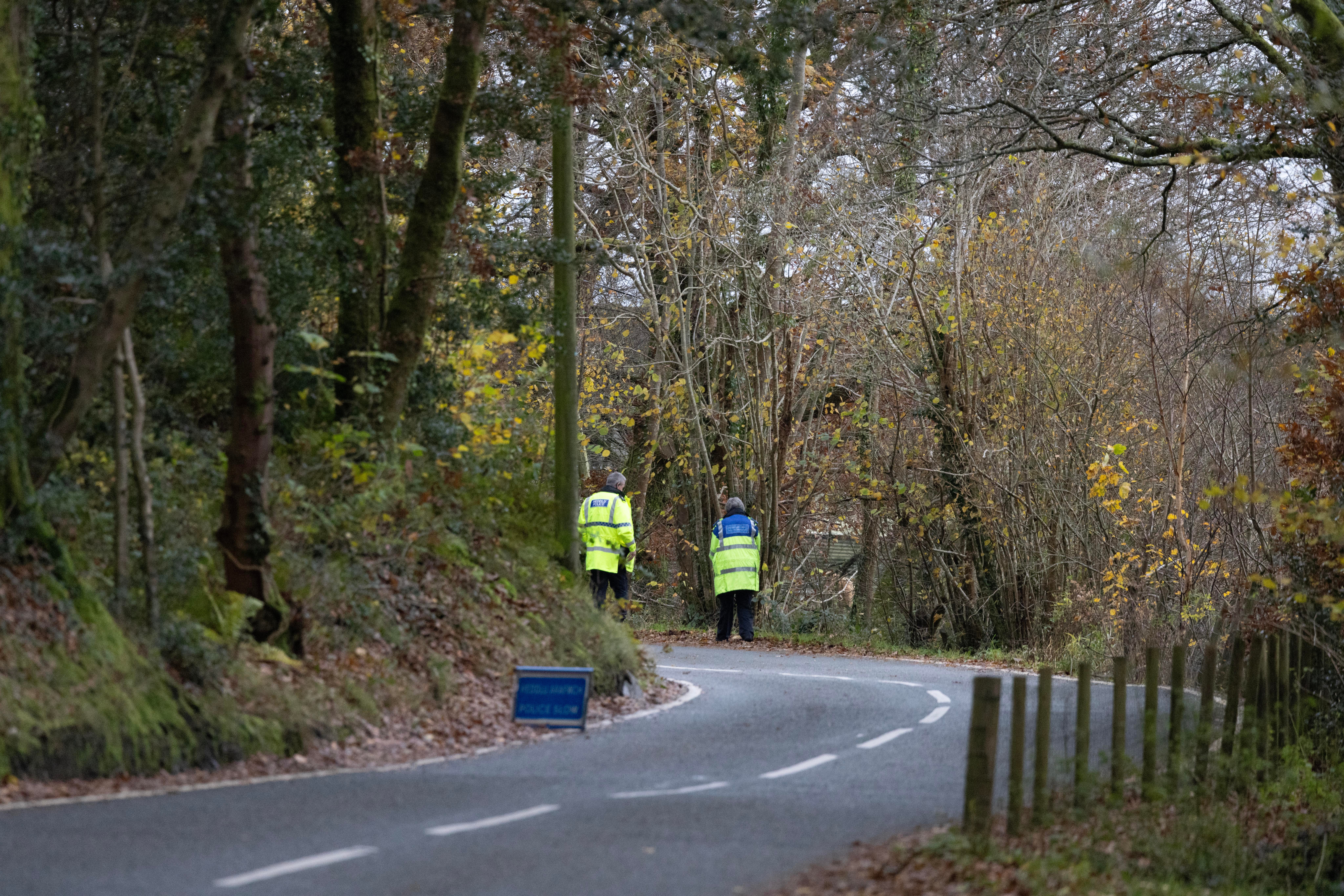 Police officers at the scene where the four teenagers were found