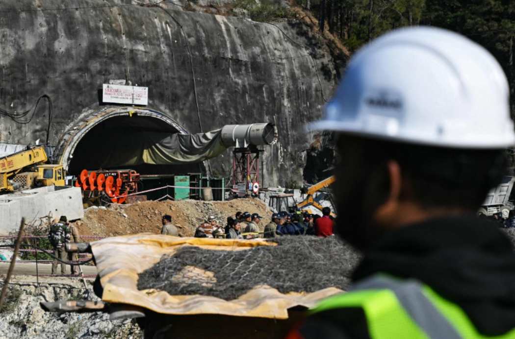 Rescue workers are busy trying to reach the trapped tunnel workers who will be medically evaluated by a team of doctors first and then brought out on stretchers after the operation is over