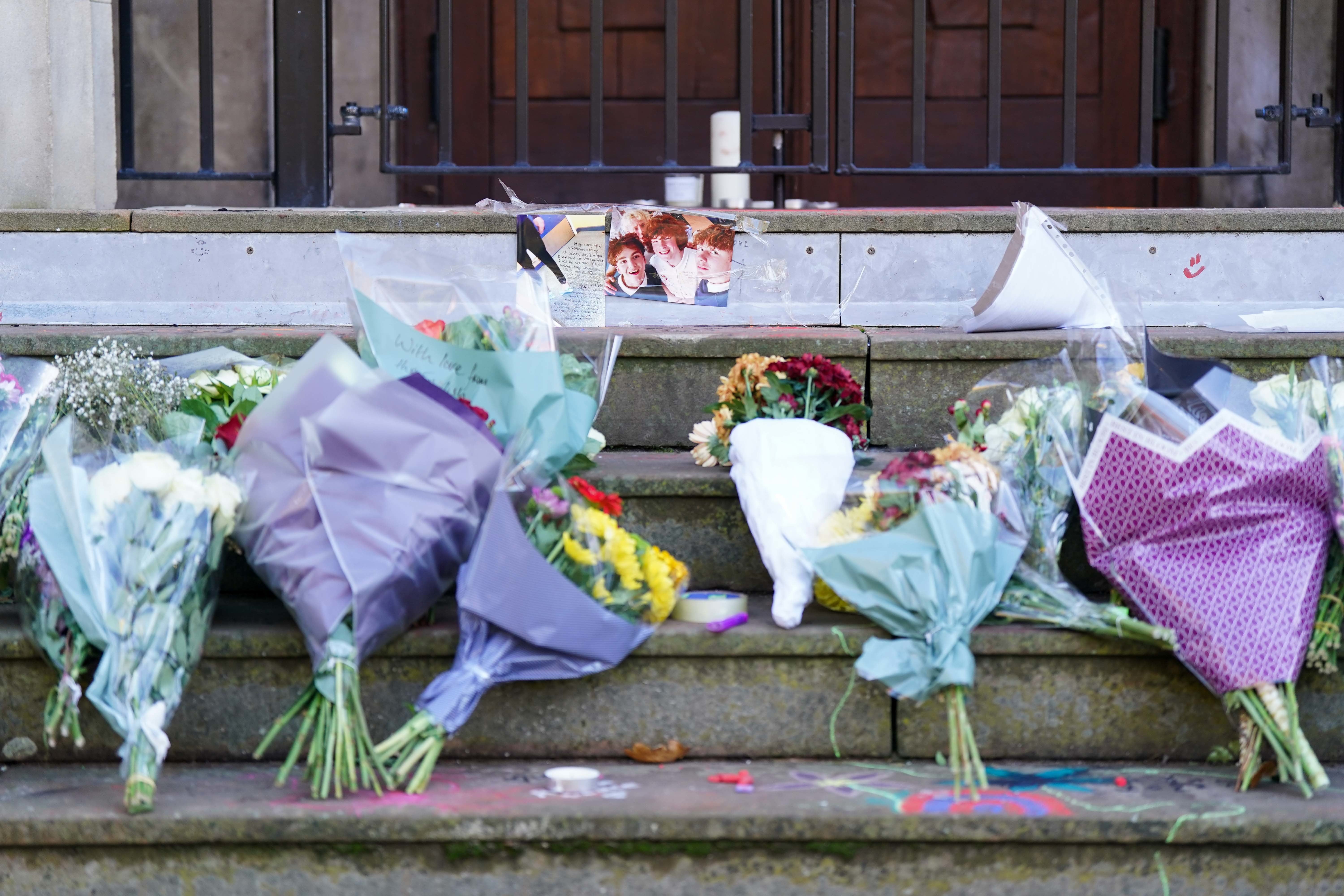 Tributes left on the steps at Shrewsbury College following the deaths of the four teenagers