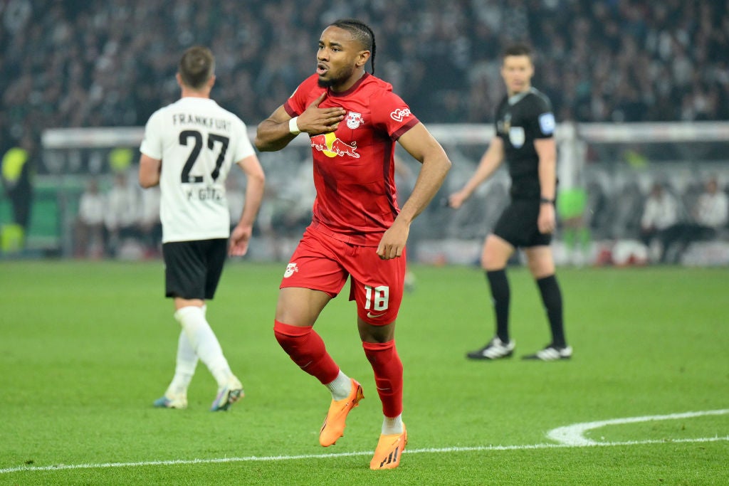 Christopher Nkunku, then of RB Leipzig, celebrates scoring during the DFB Cup final in June