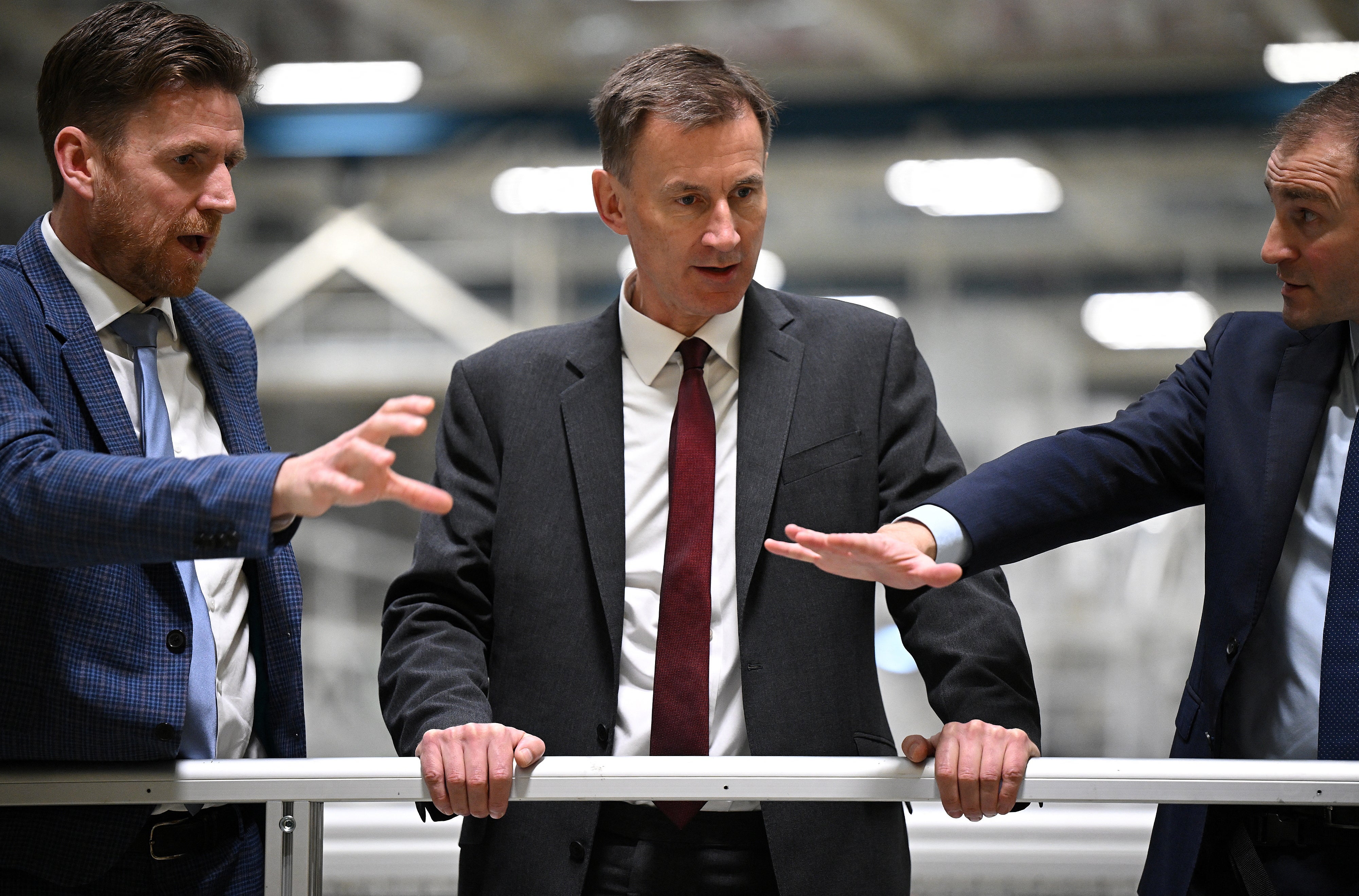 Jeremy Hunt is shown an Airbus A350 wing being made at an aircraft plant in Broughton near Chester on Thursday