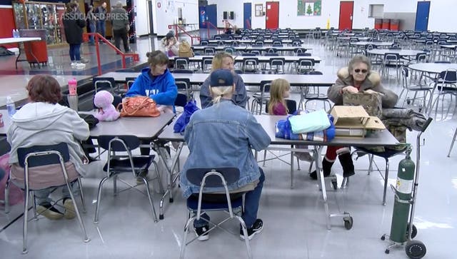 <p>Residents spent the night in a local middle school </p>