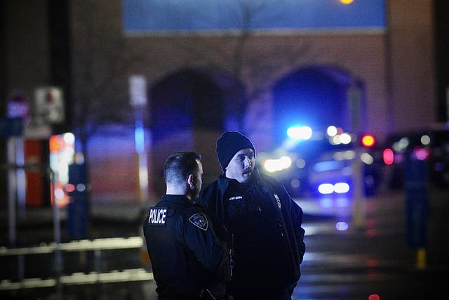 <p>Police pictured outside a Walmart in Beavercreek Ohio shortly after a gunman injured four people and later died of a self-inflicted gunshot wound on 20 November.</p>