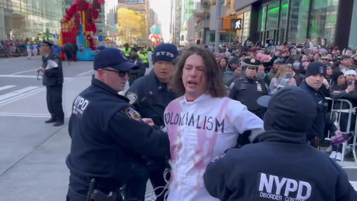 Activists dragged away after interrupting Macy’s Thanksgiving parade
