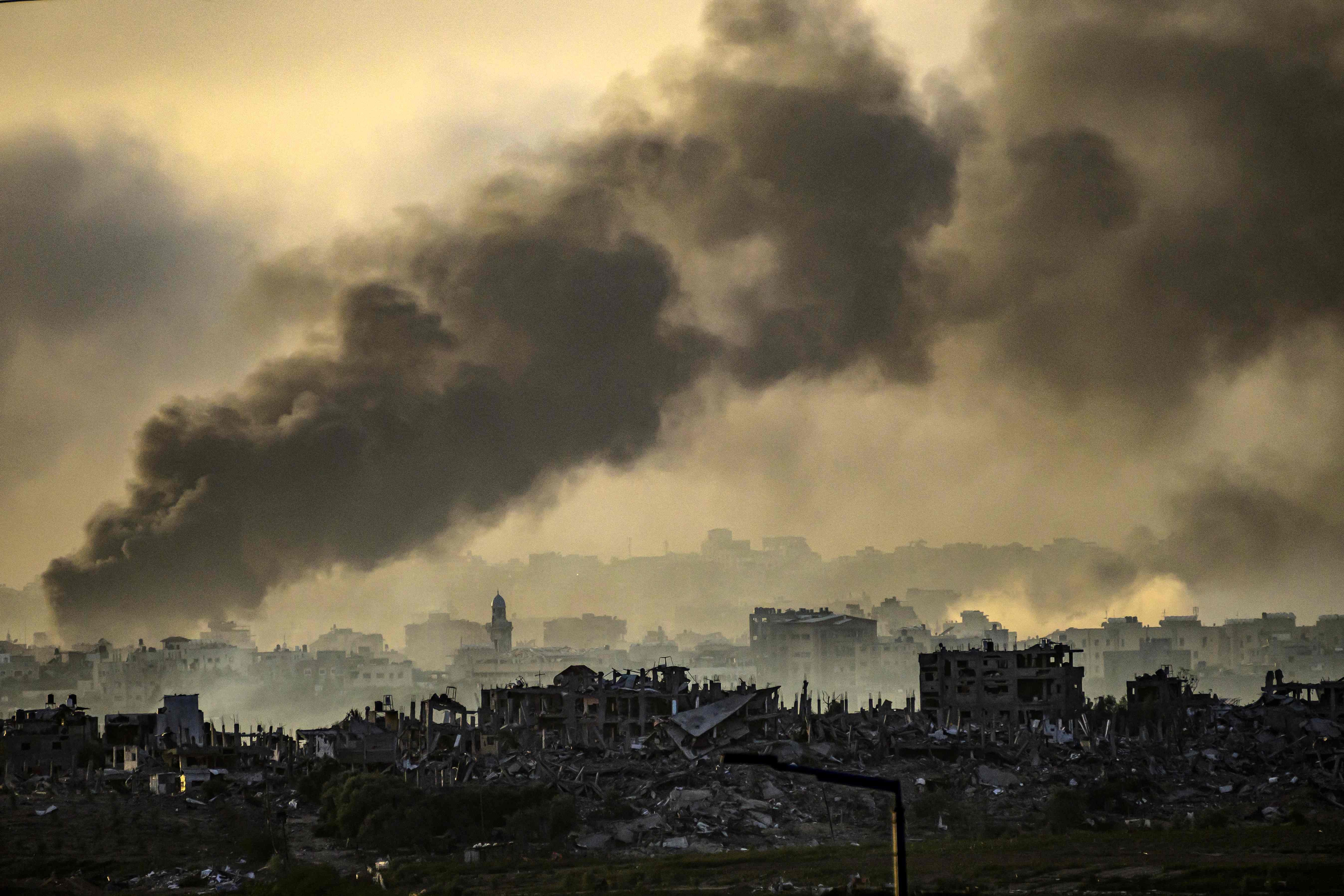 The view from the Israeli side of the border with the Gaza Strip on Thursday, showing the impact of Israeli strikes