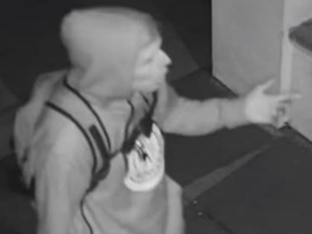 <p>Black-and-white CCTV image of suspect</p>