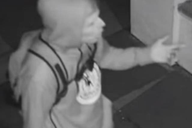 <p>Black-and-white CCTV image of suspect</p>
