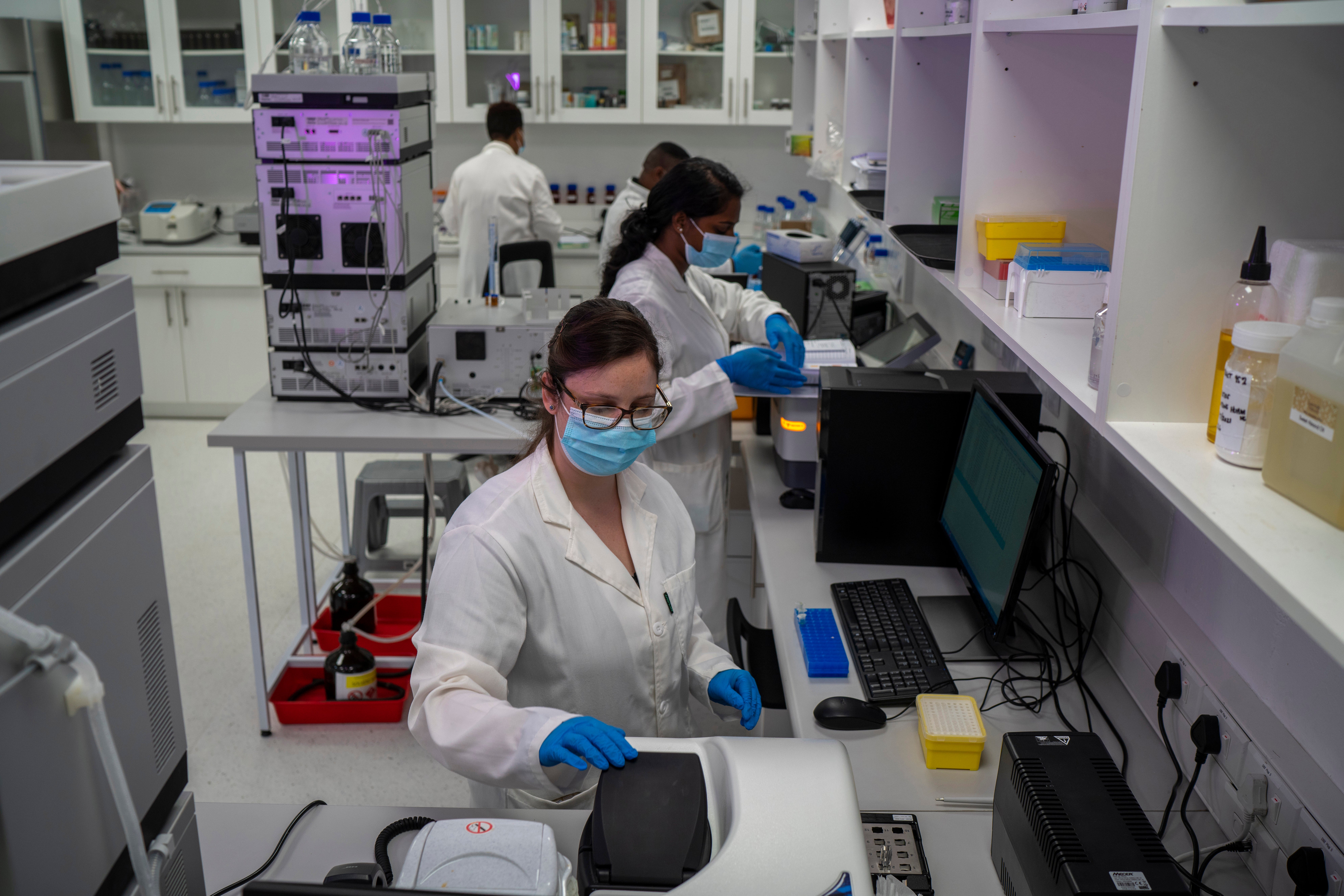 Scientists conduct reserach at an Afrigen Biologics and Vaccines facility in Cape Town, South Africa