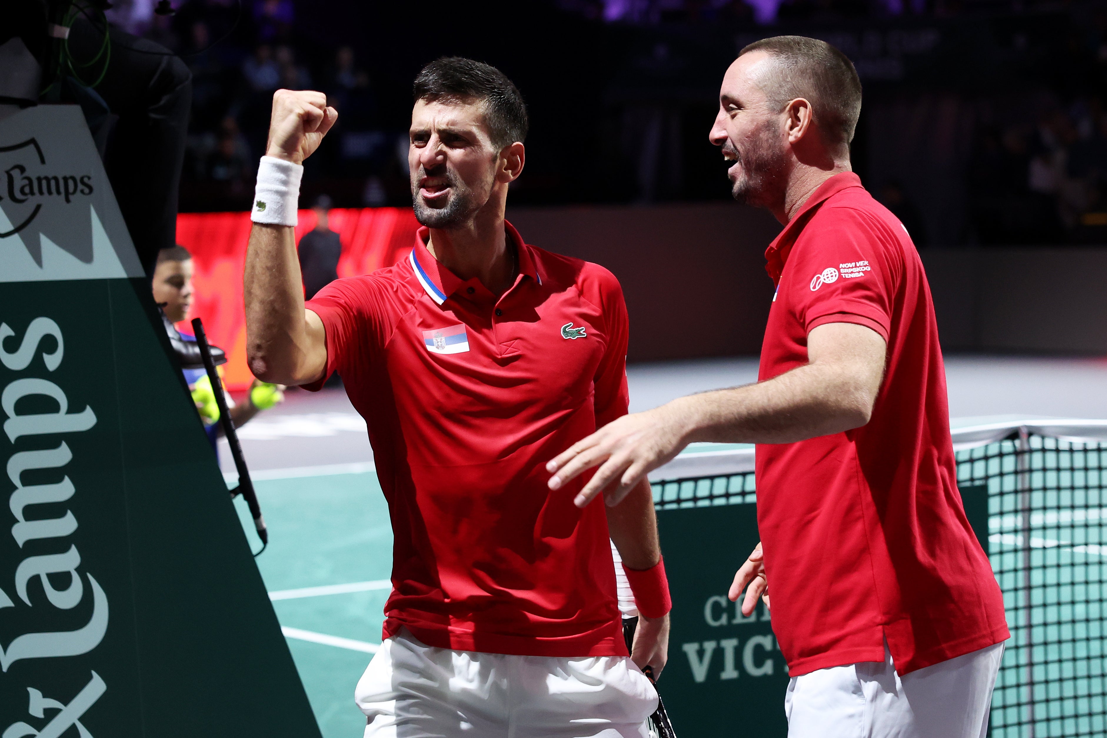 Djokovic celebrates leading Serbia to victory in the quarter-finals