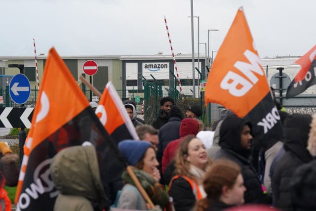 Amazon staff on a GMB union picket line outside the online retailer’s site in Coventry (Jacob King/PA)