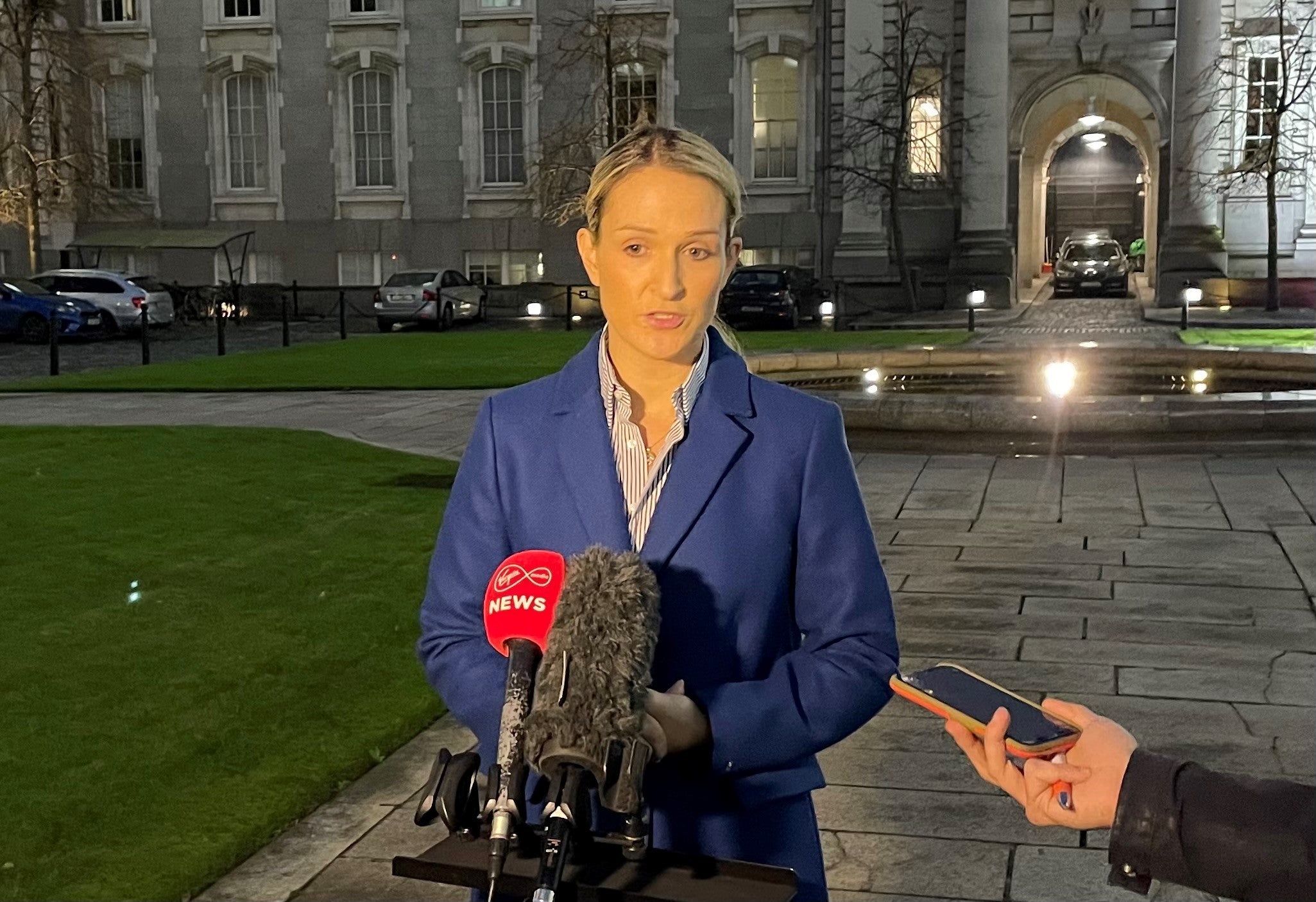 Ireland's Justice Minister Helen McEntee speaking to the media outside Government Buildings on Friday