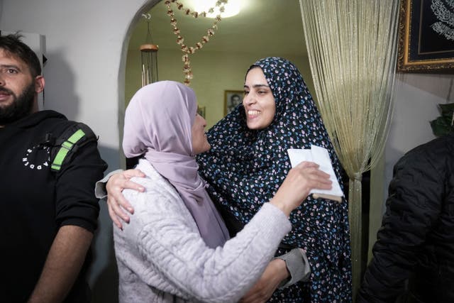 <p>Marah Bakir, right, a former Palestinian prisoner who was released by the Israeli authorities, is welcome at her family house in the east Jerusalem neighborhood of Beit Hanina </p>