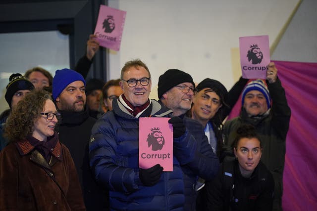 Everton fans protest outside the Premier League headquarters in London over the club’s 10-point punishment for breaching financial regulations (Yui Mok/PA)