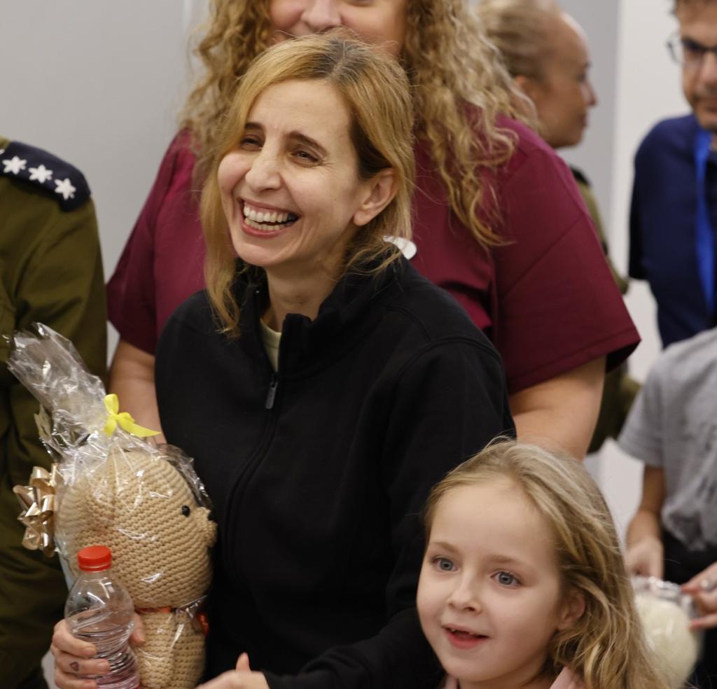 <p>Amelia and her mother Daniel are pictured smiling as they arrive at Schneider Children's Medical Center</p>