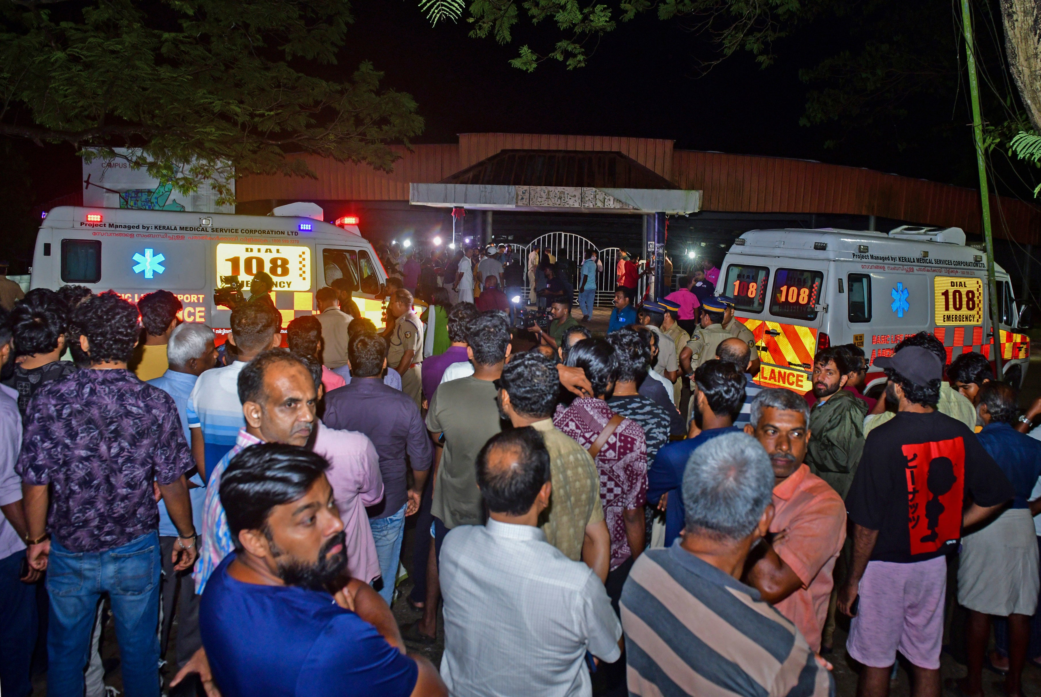 <p>People gather outside after a stampede at the venue of a music concert at the Cochin University </p>