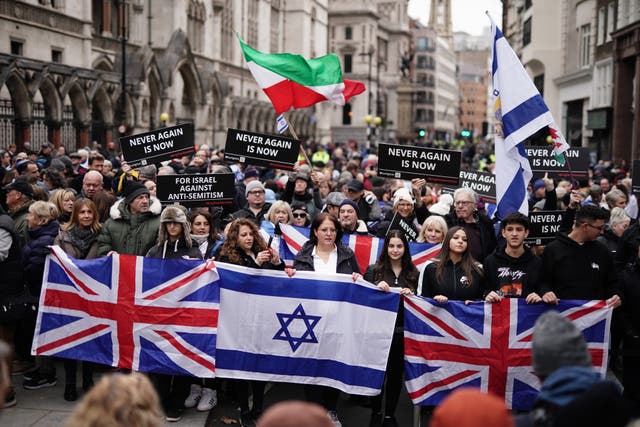 <p>People take part in a march against antisemitism organised by the volunteer-led charity Campaign Against Antisemitism at the Royal Courts of Justice in London. Picture date: Sunday November 26, 2023.</p>