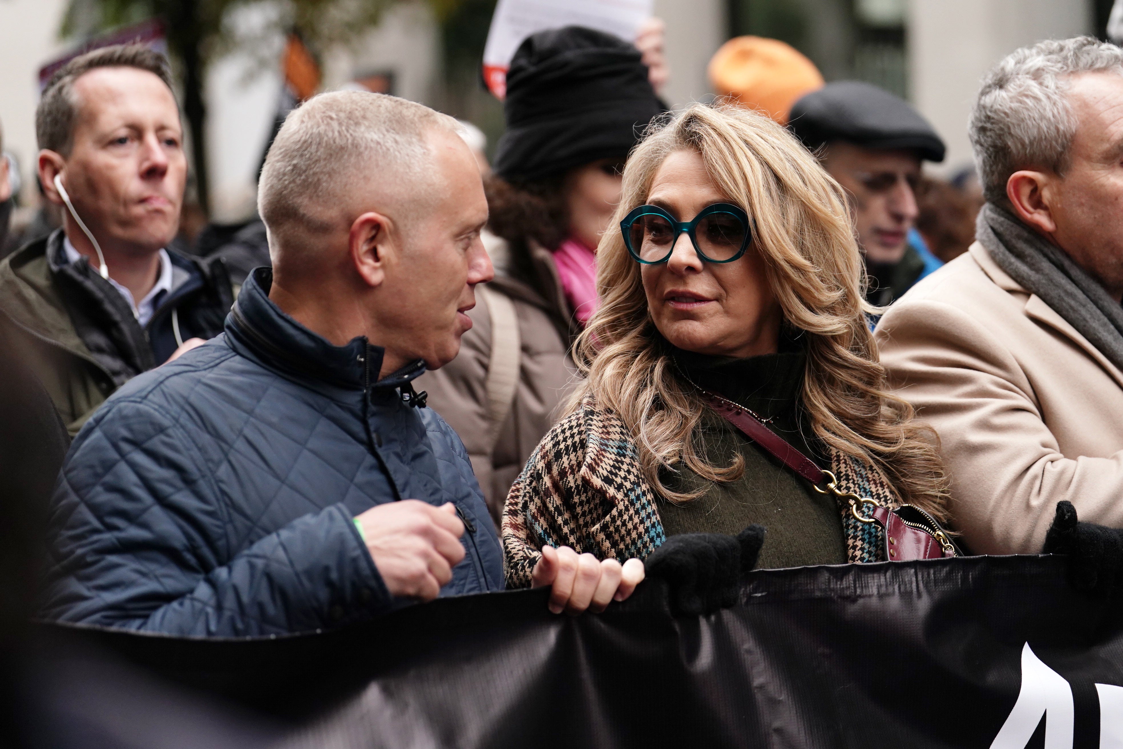 The two were seen holding a banner