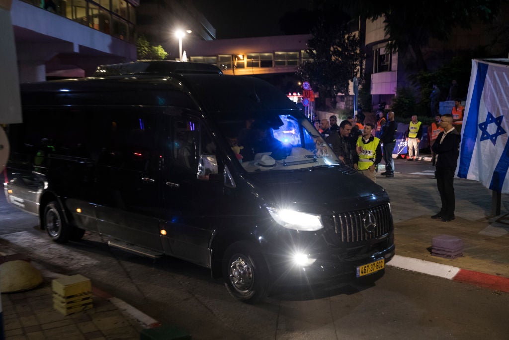 <p>A van carrying hostages held in Gaza arrives in Israeli territory</p>