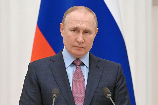 <p>Russia’s President Vladimir Putin attends a press conference with his Belarus counterpart, following their talks at the Kremlin in Moscow on February 18, 2022</p>
