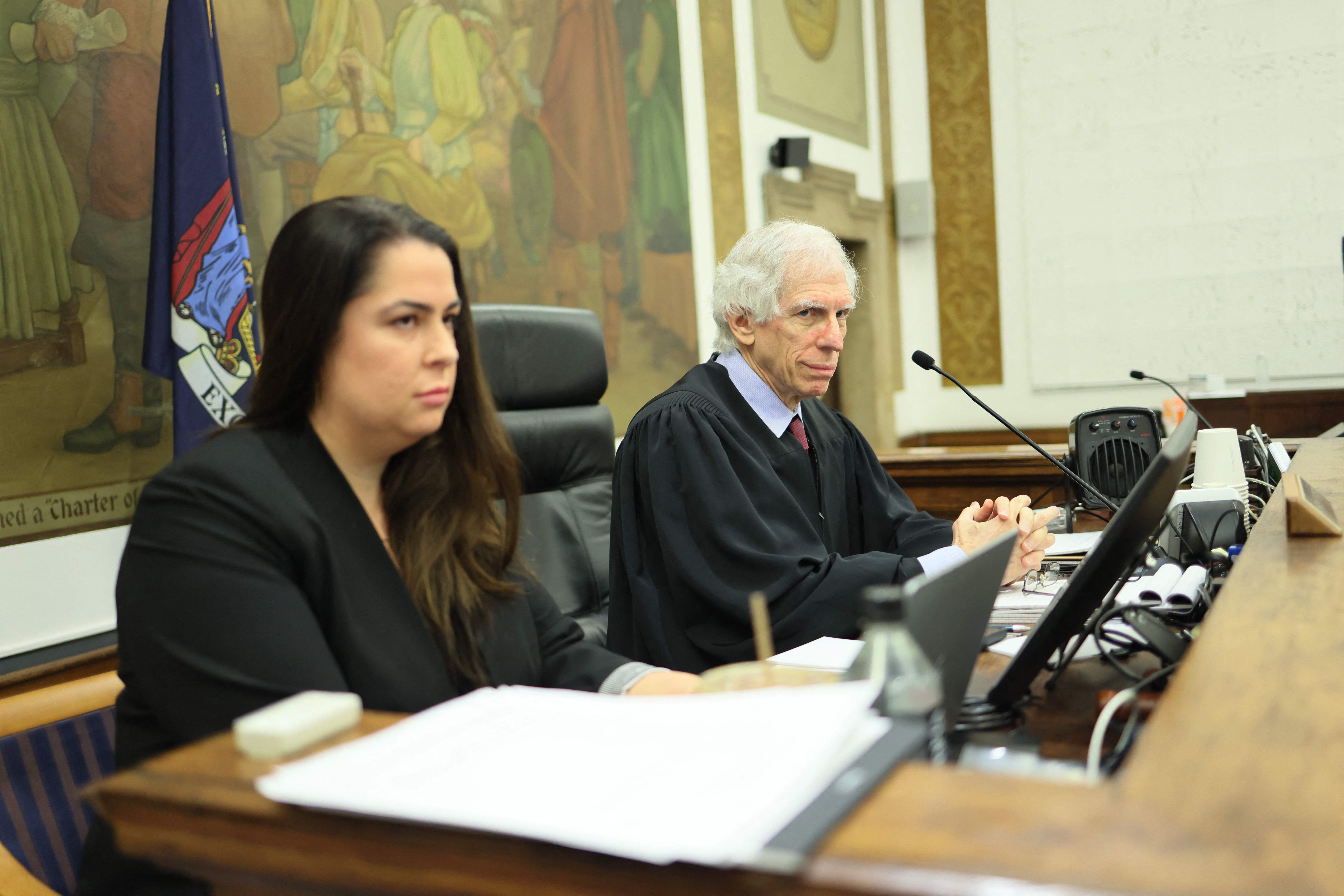 Justice Arthur Engoron, right, presides over the civil fraud trial of the Trump Organization at the New York State Supreme Court in New York City, with his principal clerk Allison Greenfield.