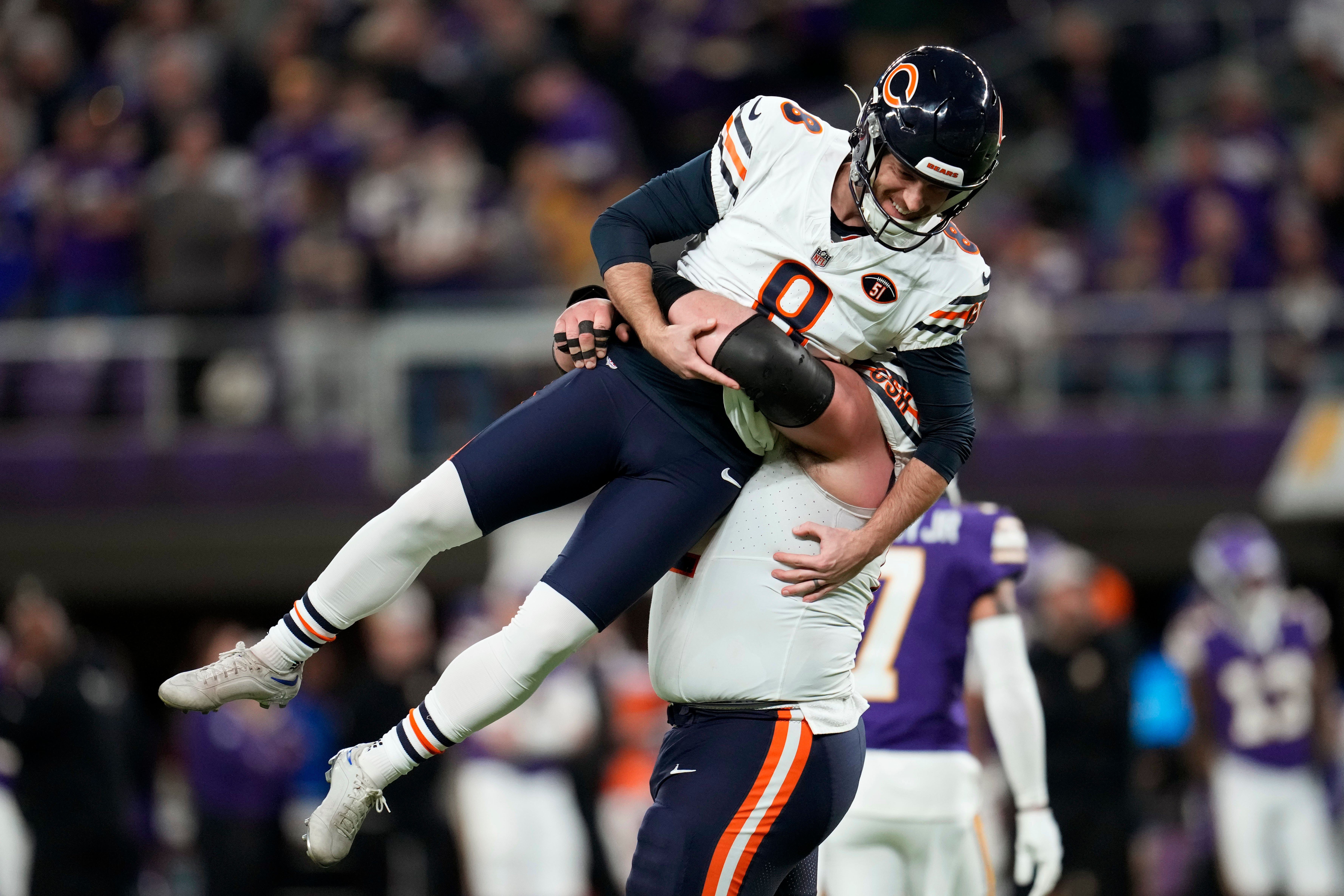 Chicago Bears place-kicker Cairo Santos celebrates with guard Lucas Patrick (Abbie Parr/AP)