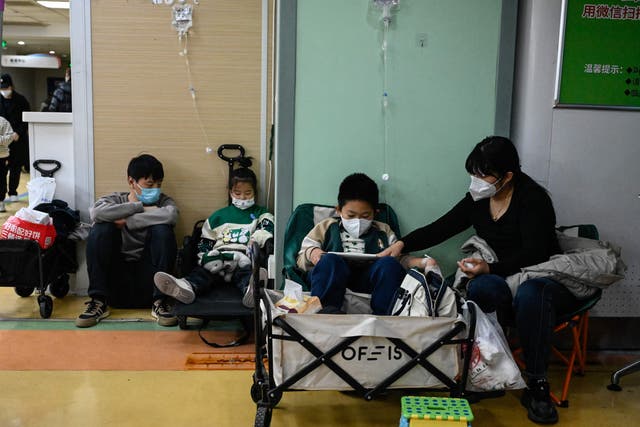 <p>Children receive a drip at a children hospital in Beijing, China</p>