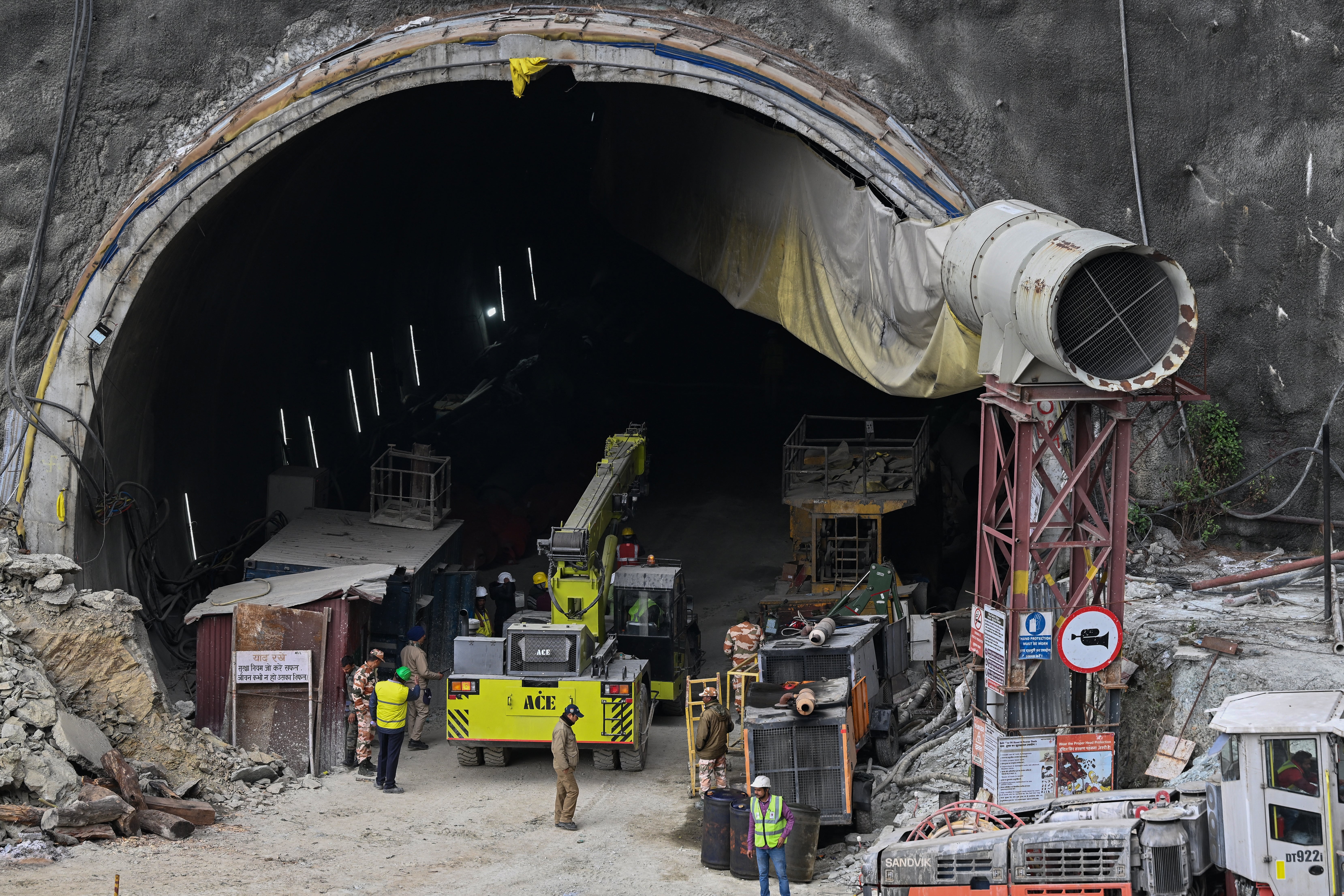 Rescue personnel work at the collapsed under construction Silkyara tunnel