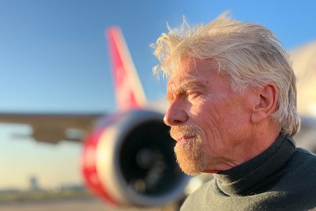 <p>Air pioneer: Sir Richard Branson beside a Virgin Atlantic at London Heathrow Boeing 787 Dreamliner about to depart to New York JFK </p>