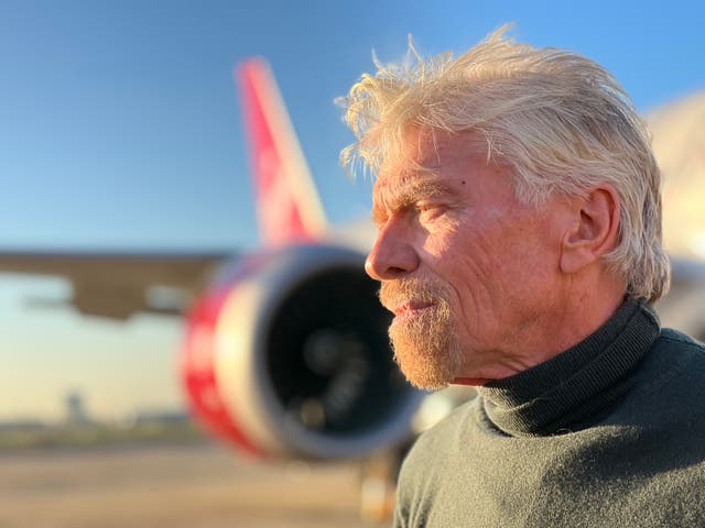 <p>Air pioneer: Sir Richard Branson beside a Virgin Atlantic at London Heathrow Boeing 787 Dreamliner about to depart to New York JFK </p>