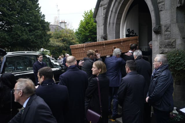 Ben Dunne’s casket is carried in to St Mochta’s church in Clonsilla, west Dublin for his funeral service. Mr Dunne, 74, who was the former director of family business Dunnes Stores and the owner of a chain of gyms, died last week while holidaying in Dubai. Picture date: Tuesday November 28, 2023.