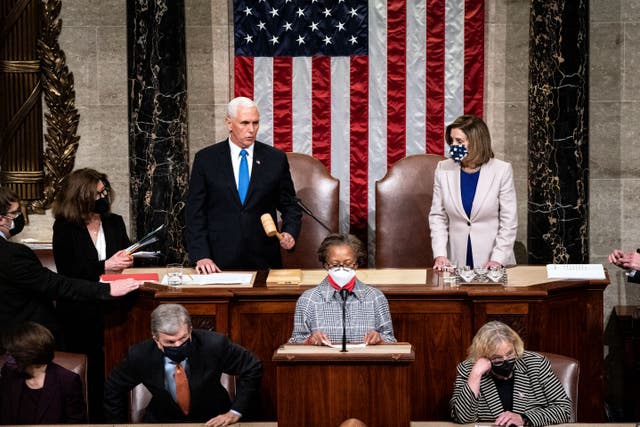 <p>Vice President Mike Pence and Speaker of the House Nancy Pelosi (D-CA) preside over a joint session of Congress on January 6, 2021 in Washington, DC</p>