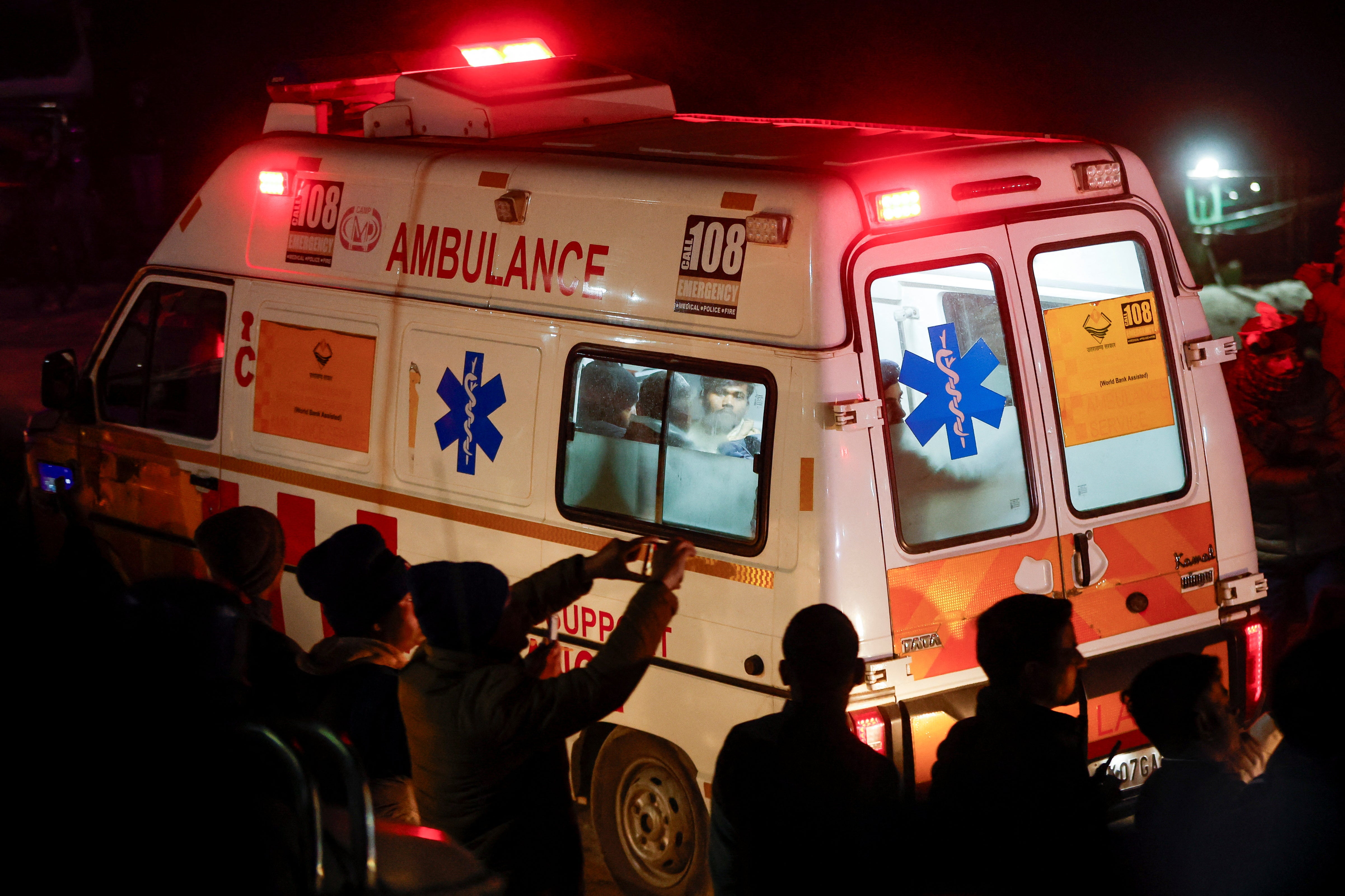 Ambulance carries survivors to receive medical support