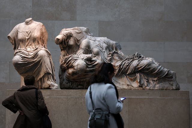 Visitors look at the Elgin marbles, also known as the Parthenon marbles, at the British Museum on Tuesday.