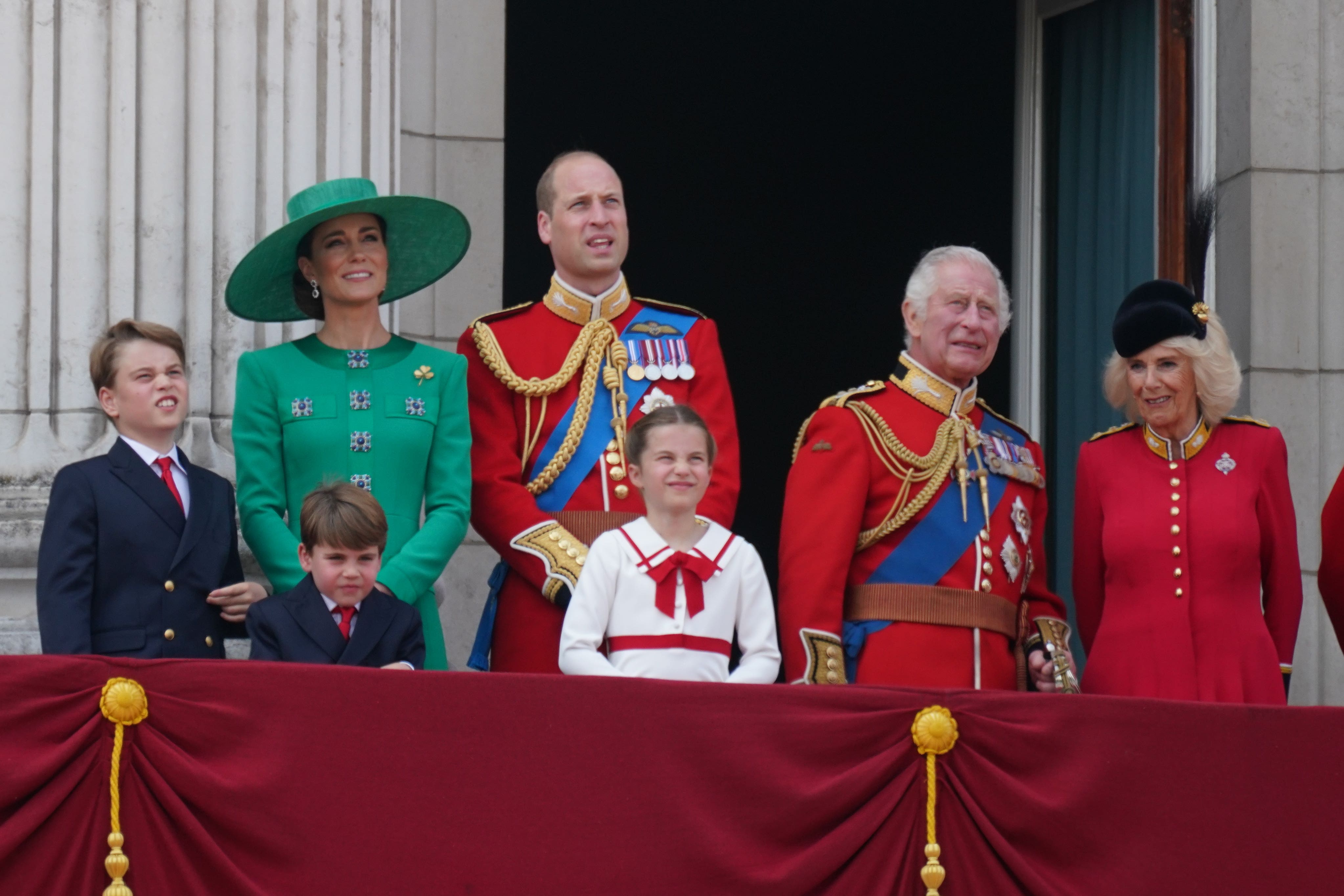 Prince George, the Princess of Wales, Prince Louis, the Prince of Wales, Princess Charlotte, King Charles and Queen Camilla on the balcony of Buckingham Palace