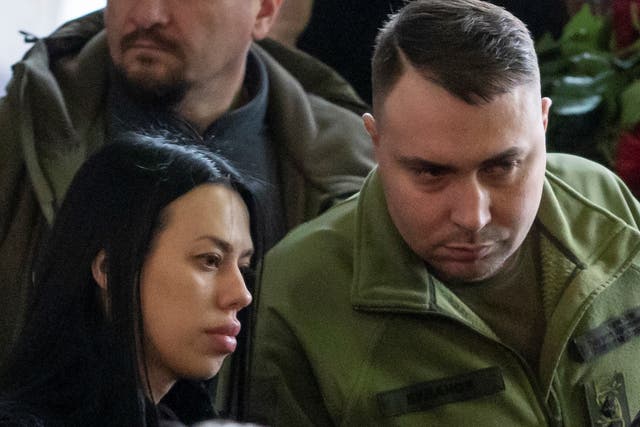<p>Kyrylo Budanov and his wife Marianna, who has been diagnosed with heavy metals poisoning, attending a memorial ceremony for a Ukrainian interior minister in January </p>