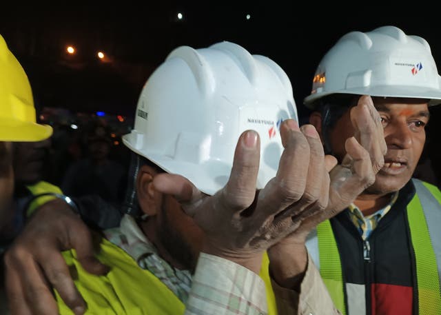 <p>An emotional worker is seen following their rescue from inside the under-construction Silkyara tunnel on the Brahmakal Yamunotri National Highway in Uttarkashi, India</p>