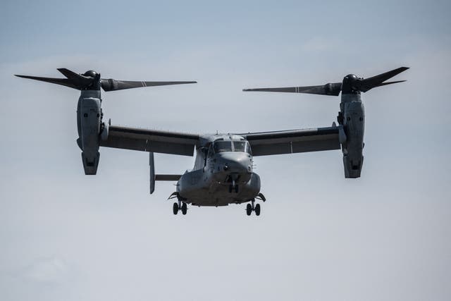 <p>This file photo taken on 15 March 2022 shows a US Marine Corps MV-22 Osprey tilt-rotor aircraft landing during a joint exercise with Japanese Self Defense Forces members at the Higashifuji training area in Gotemba</p>