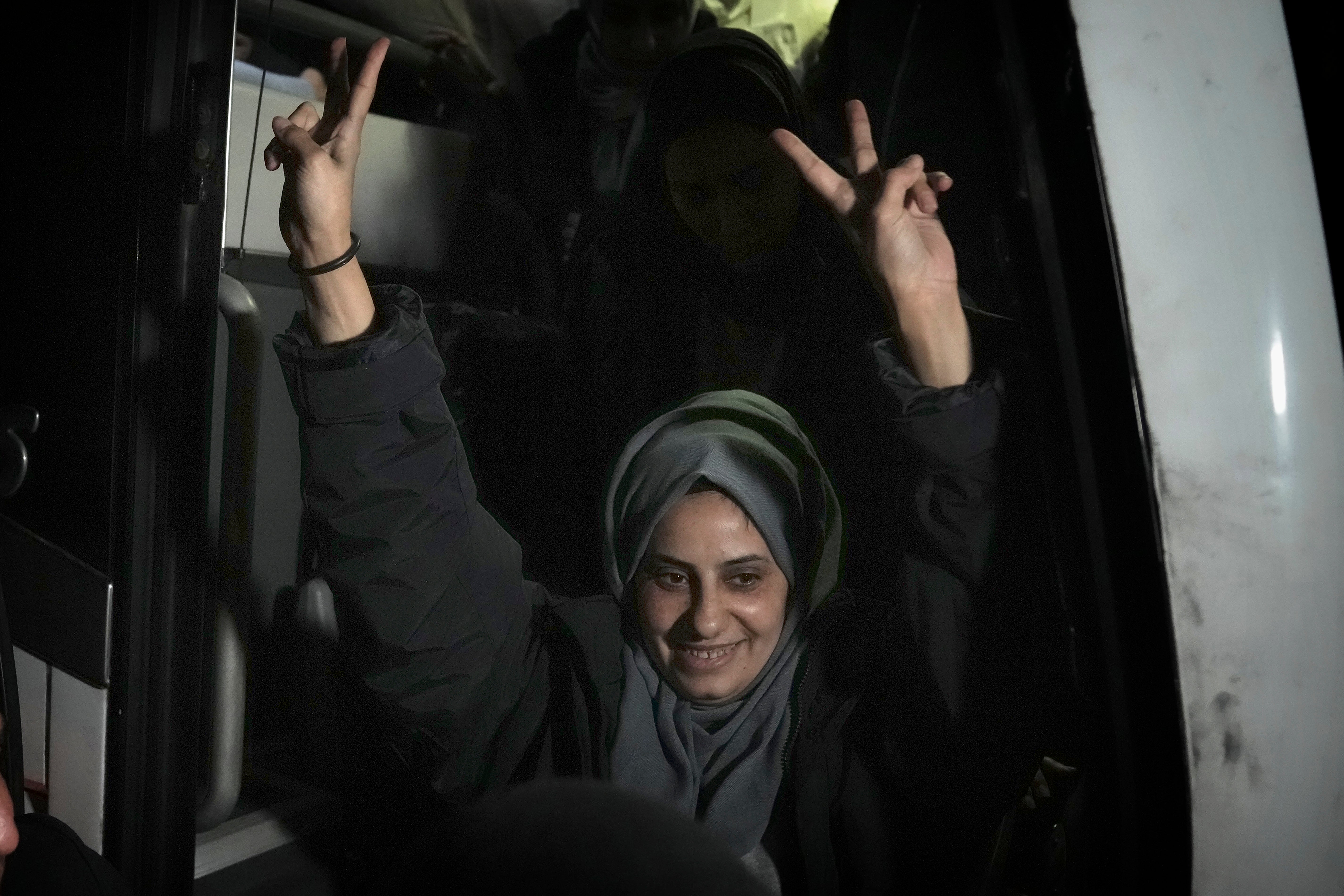 Palestinian Lamis Abu Arkoub is greeted after she was released from prison by Israel