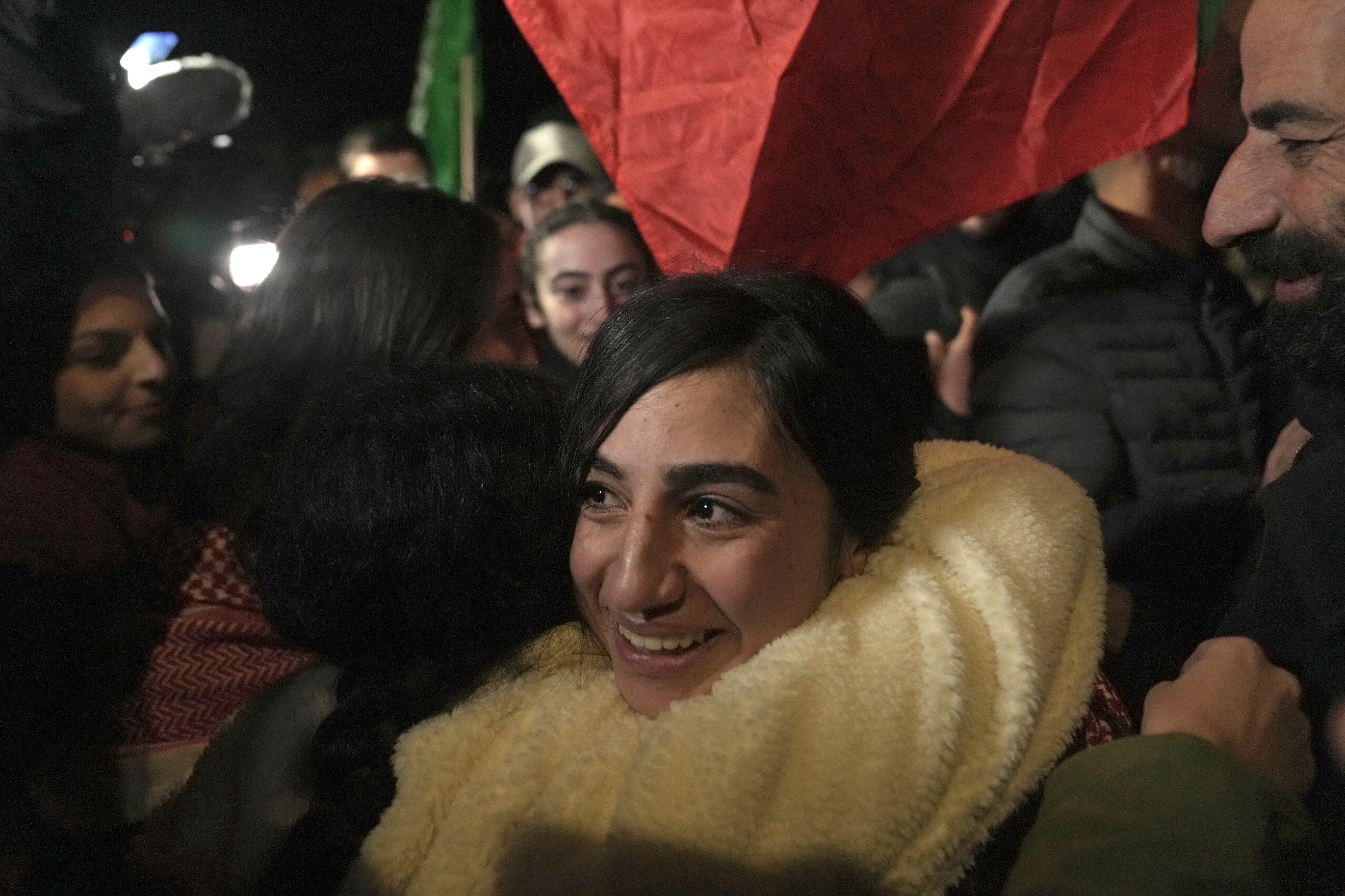 Palestinian prisoner Ruba Assi is greeted after she was released in the West Bank town of Ramallah