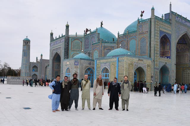 <p>Welcome break: tourists at Mazar-e-Sharif</p>