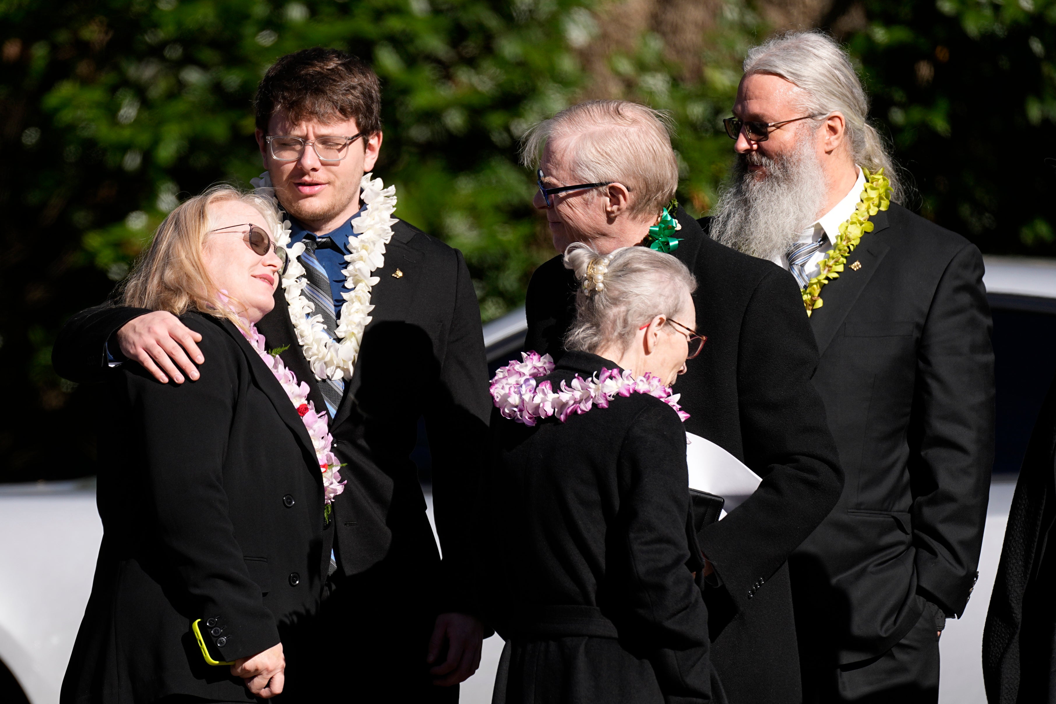 Amy Carter, left, and her husband John Joseph "Jay" Kelly, right, arrive for the funeral service for former first lady Rosalynn Carter at Maranatha Baptist Church, Wednesday, Nov. 29, 2023, in Plains, Ga.