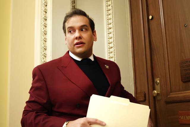<p>U.S. Rep. George Santos (R-NY) walks into the House Republican cloakroom at the U.S. Capitol on 28 November 2023 in Washington, DC. Santos spoke to reporters about his ethics report and his upcoming expulsion vote.</p>